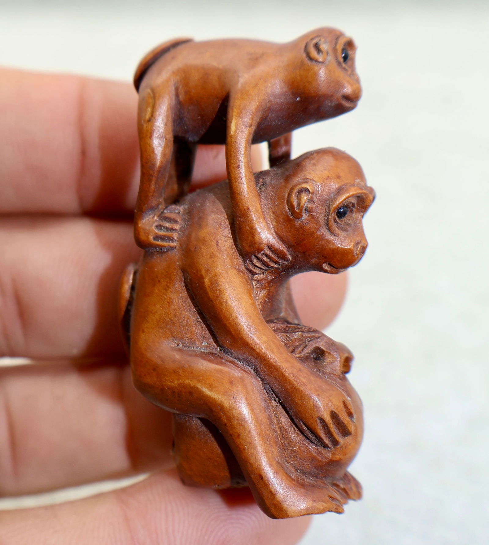 A Finely Carved Japanese Boxwood Monkey Trio Netsuke (1 of 5)