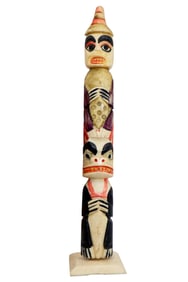A Northwest Coast Carved Bone Totem Pole