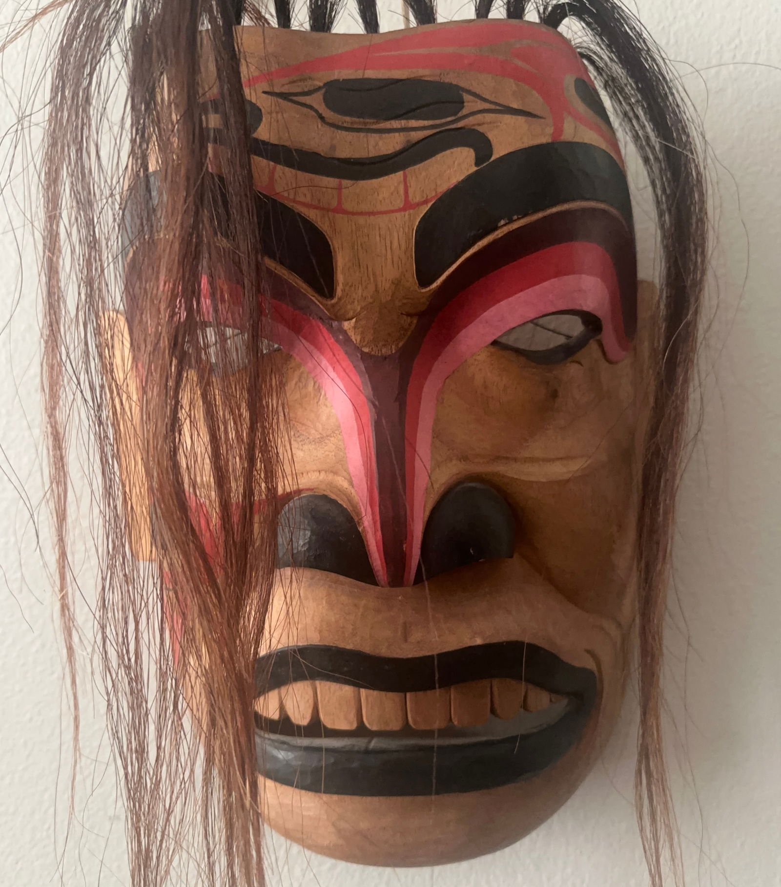 A Northwest Coast Carved & Painted Potlach Shaman Mask: Finely made. Signed on the back. Hand carved and painted wood Potlach Mask featuring whale and raven. Provenance: Private Collection, Florida