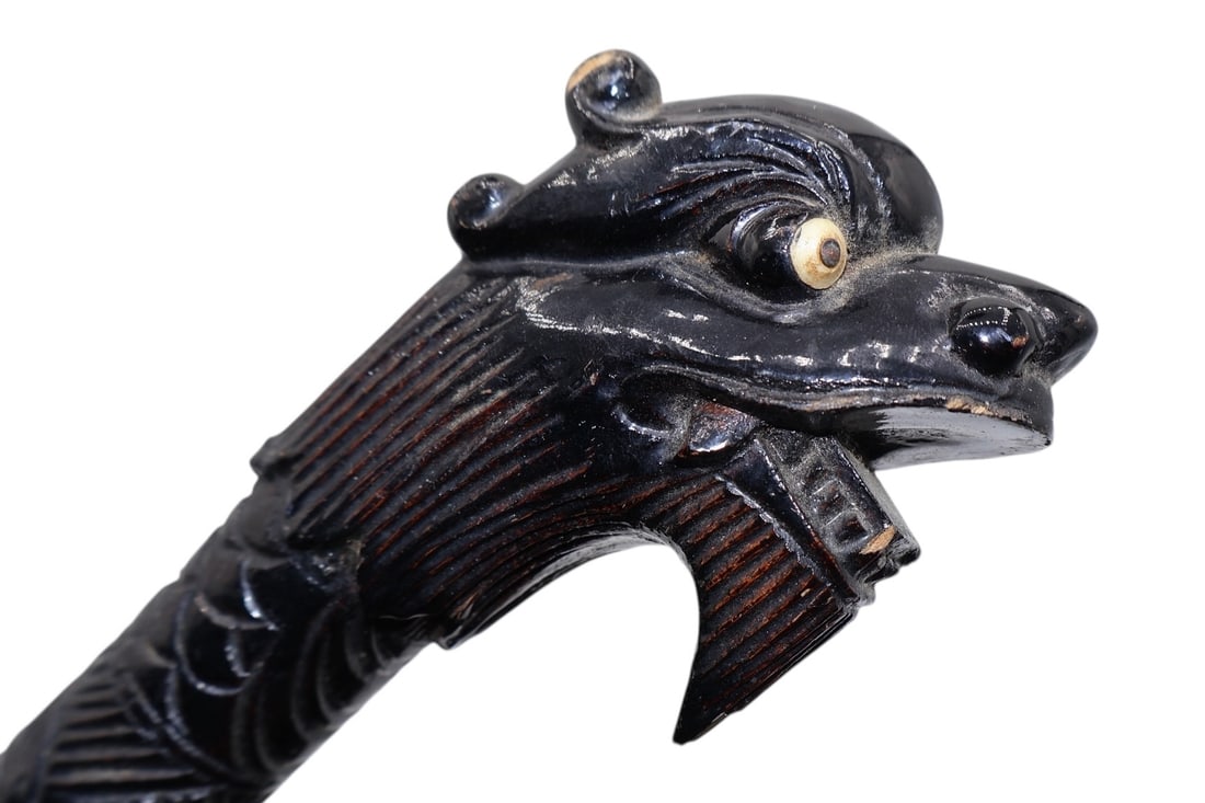 A Vietnam Era Military Dragon Swagger Stick: Carved from wood and made to look like bamboo. Vietnamese military POW carved these swagger sticks for US officers. Inlaid bone eyes and highly detailed.