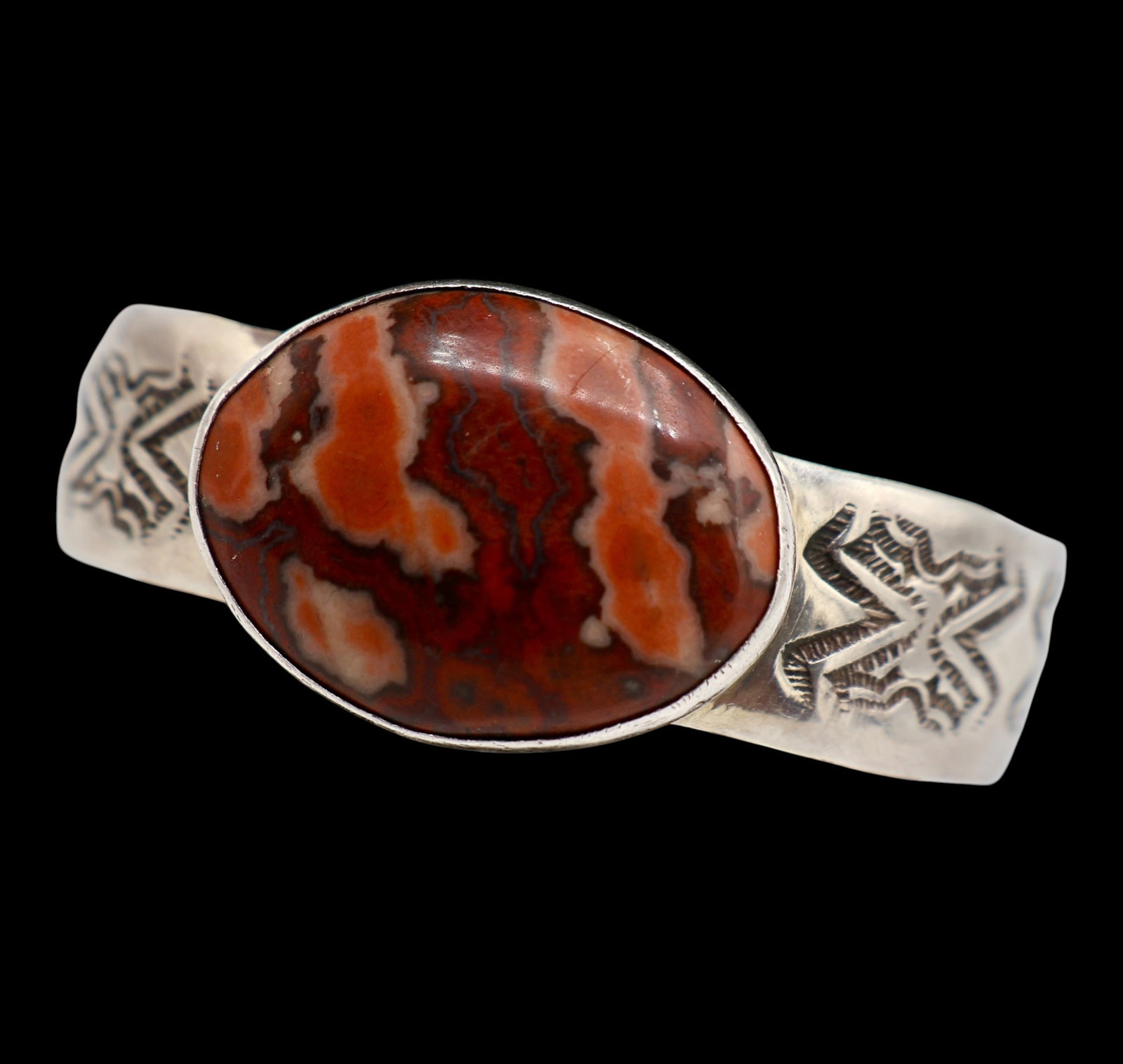 A Native American Silver Hand Stamped Bracelet Plume Agate