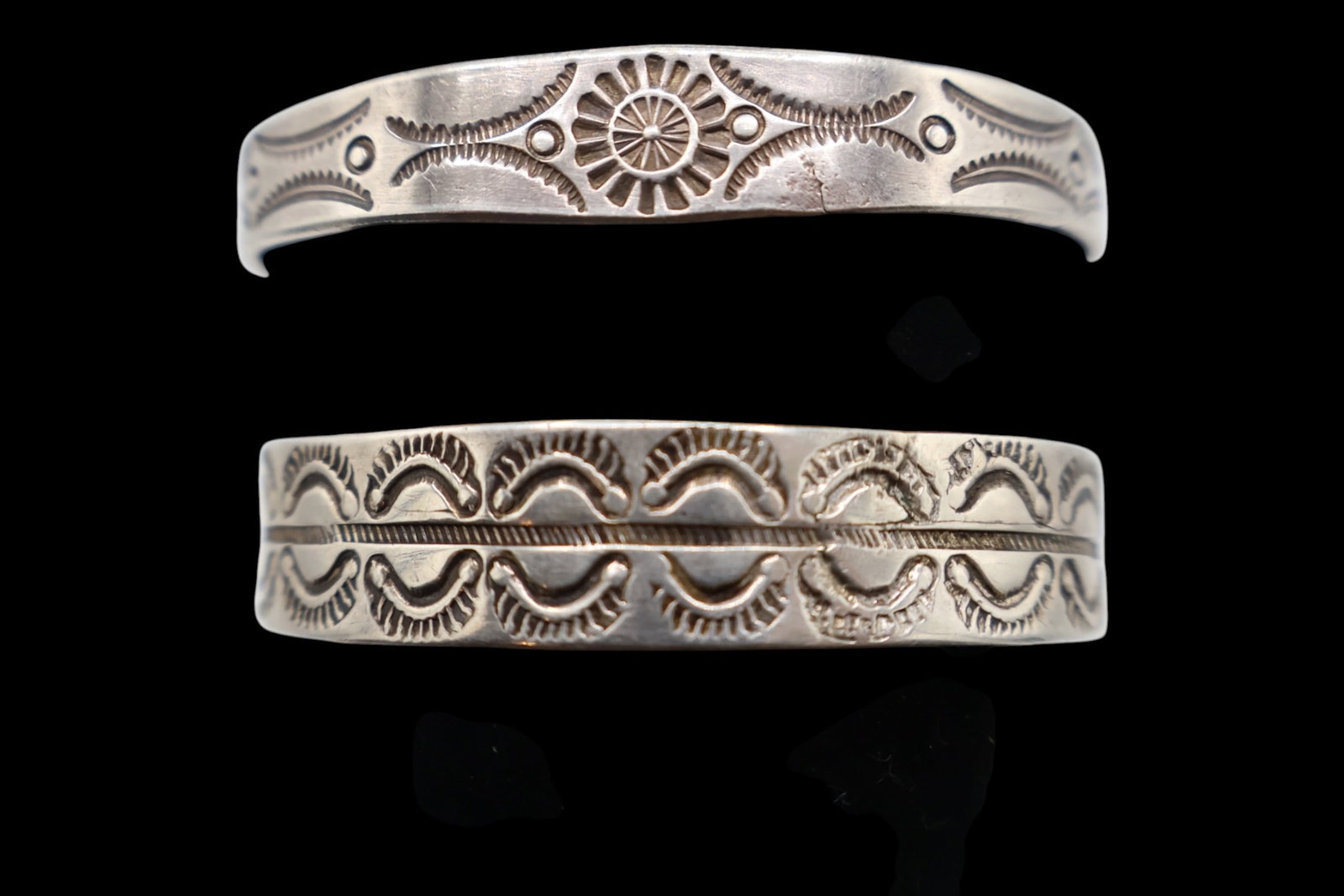 A Pair of Native American Hand Stamped Silver Cuffs (1 of 6)