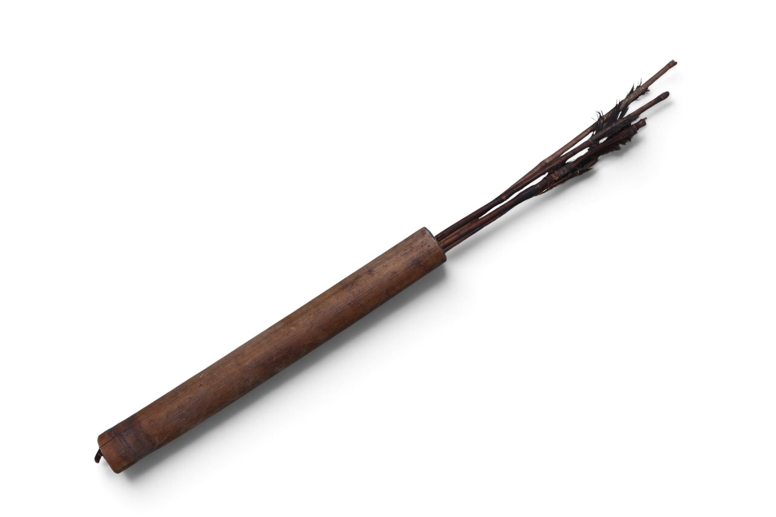A Bamboo Quiver with Iron Tipped Arrows: Possibly African or Southeast Asian. Handcrafted quiver from bamboo. The arrow shafts are also bamboo. Feather fletching. Handmade iron broad heads. 32” x 3”.