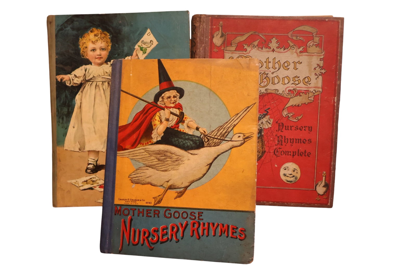 A Collection of Antique Children’s Story Books : Mother Goose Titles & Paint Book: Various antique titles.
