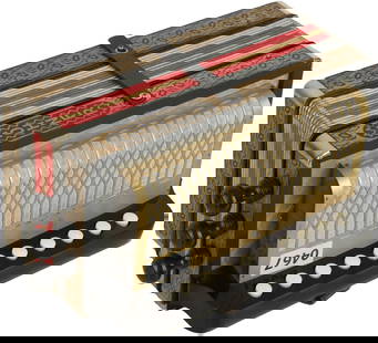 Hohner Accordion: 10 treble buttons, 2 bass. Ebony finish, gold lettering and illustrations, colour bellows. Made in Germany. Weight 1.9kg. No Visible Damage