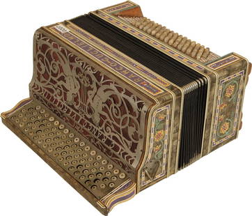 Ranco Guglielmo Accordion, Vercelli Italia: 86 treble buttons, 112 bass. Gold marble case highly decorated with colour illustrations and illustrated metal grille. Made in Italy. Weight 9kg. Broken treble buttons, missing screws from treble butt