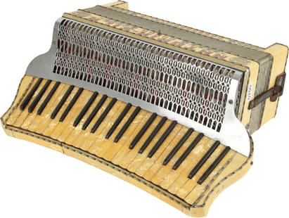 Antoria-S.I.L.A. Omega Accordion, Camerano Italia: 41 keys, 120 bass. Curved keyboard 19.5". Gold marble case, gold marble keys, gold glitter trim, colour illustrations, red and jewelled lettering, illustrated metal grille. Made in Italy. Weight 10kg.