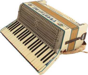 Frontalini Accordion: 41 keys, 120 bass. Keyboard 19". White finish with colour illustrations and blue lettering, metal grille. Comes with leather strap. Made in Italy. Weight 7.7kg. A few stuck bass notes, light spots to