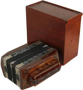 Victoria Accordion in wooden box: 10 treble buttons, 3 bass. Wood finish with gold illustrations, black bellows with metal corner caps, tortoiseshell treble caps. Comes with wooden box. Made in Germany for Kay & Company. Weight 1.
