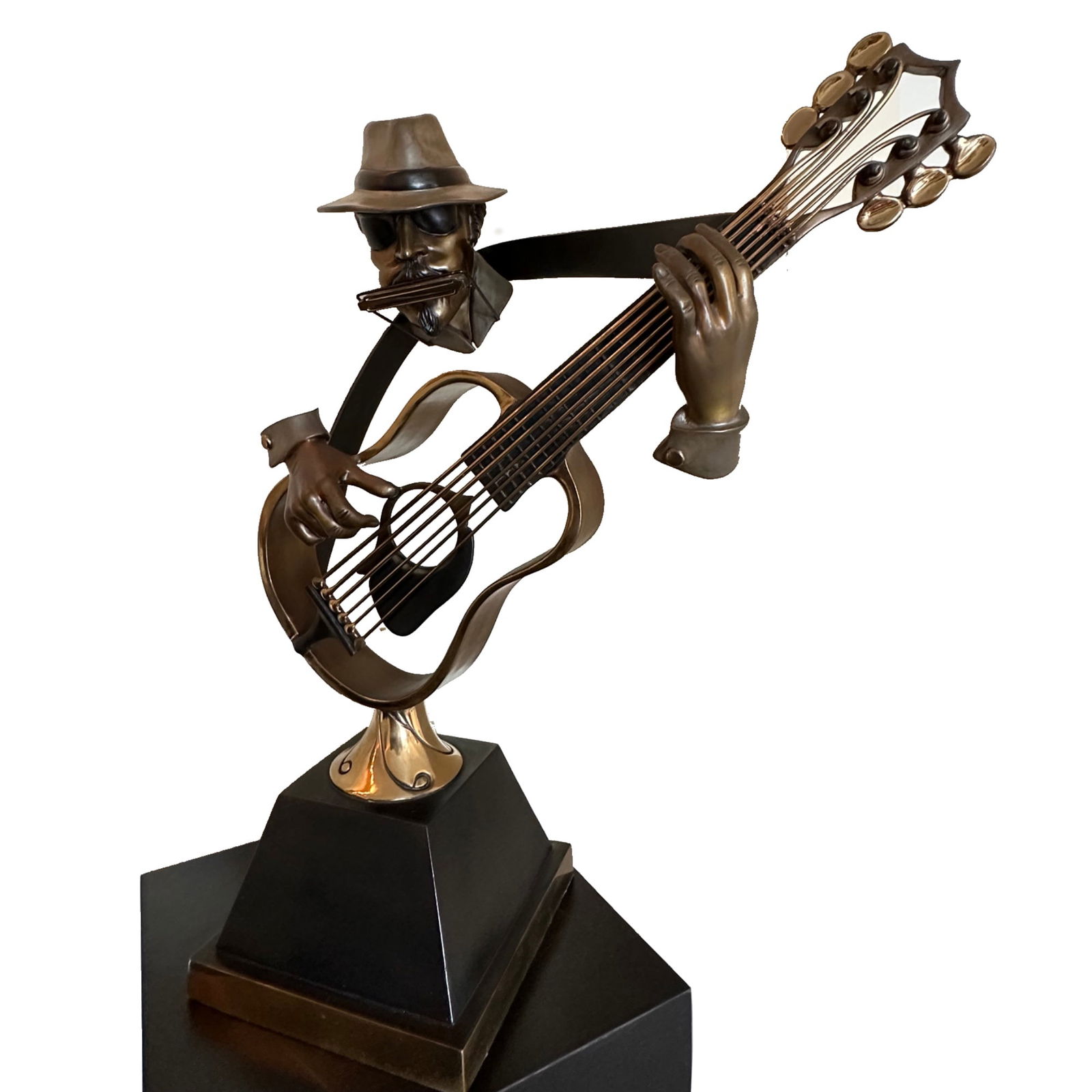 Royal Blues by Paul D. Wegner: This lot presents Singin’ the Blues, a dynamic bronze sculpture by Paul Wegner, executed with a polished patina and mounted on a complementary marble base. The composition depicts a stylized jazz