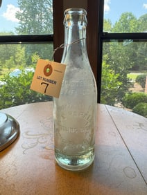 Property of LE Parker bottle