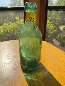 T Maher Savannah, GA Embossed Green Bottle