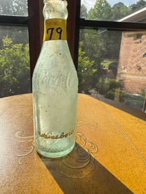 Embossed Swainsboro, GA Coca Cola Bottle chipped top
