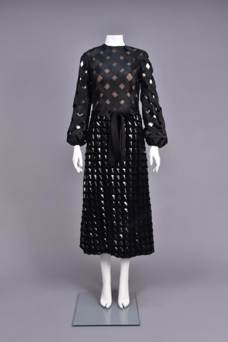 GALANOS MIXED MEDIA BASKETWEAVE DRESS, 1970s: Black with bodice and long gathered sleeve of woven silk satin ribbon over chiffon and white voile, narrow A-line skirt woven in velvet ribbon and black vinyl, silk ribbon sash and silk lining. Labele