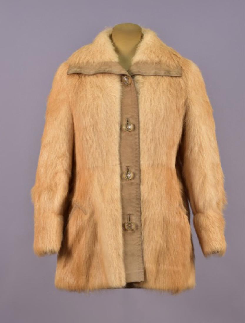 HALSTON LEATHER-TRIMMED MINK JACKET, 1970s: Blonde mink having wide collar, tan pig suede button placket with clear resin buttons inset with silver ring, angled pockets trimmed in suede. Labeled. B-40, Sh-17, Slv-24, L-30. (Suede trim soiled, l