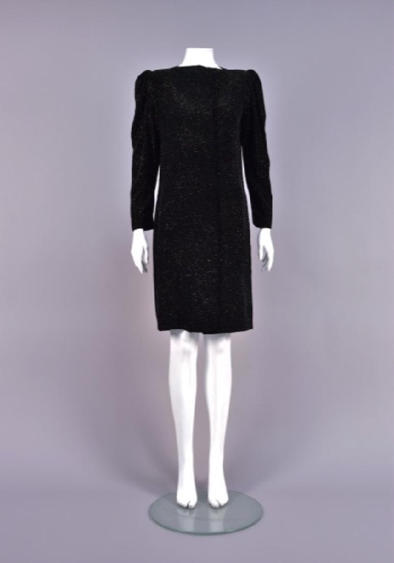 LANVIN SPARKLING VELVET COAT DRESS, 1980s.: Black rayon blend covered in tiny glitter dots, having long sleeve, boatneck and hidden buttons to hem, neckline can be worn open forming a velvet collar. Labeled. B-38, W-34, L-39. Excellent.