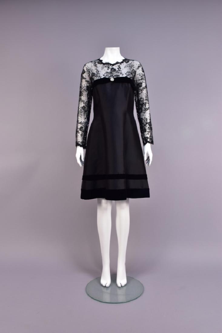 TWO OSCAR de la RENTA SILK and VELVET DRESSES: Both black with long sleeve: One velvet cut to chiffon with repeating floral devices and wide hem border. B-38, W-30, H-38, L-40. One having sheer lace bodice top with velvet band and rhinestone ornam