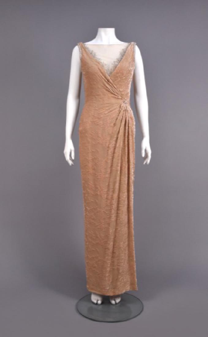 BOB MACKIE VOIDED VELVET GOWN: Pink cut to nude having sleeveless faux-wrap illusion bodice and back pointed drape trimmed in pearls, silver beads, and rhinestones, skirt having front drape and crepe lining, full inside corset. Unl