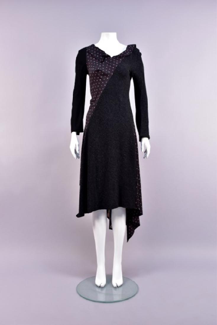 COMMES des GARCON PIECED MIXED FABRIC DRESS: Various wool and polyester fabrics including solids, floral printed and plaid, having long flared sleeve, asymmetrical neckline with seam details, unfinished asymmetrical hem angled in front and squar