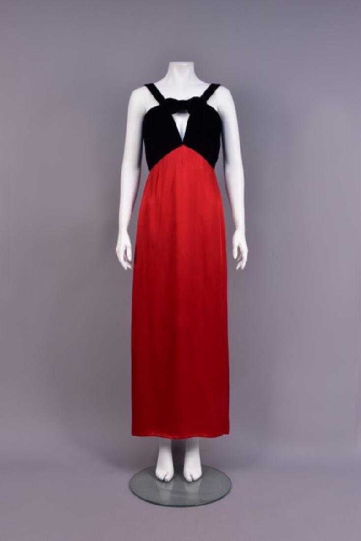YSL RIVE GAUCHE SILK and VELVET EVENING GOWN, 1994: Shown in the 1994 ad campaign, high-waist black velvet bodice cut on an angle with wide strap, center notch joined by self bow, lipstick red narrow A-line skirt with deep slit to one side. Labeled. B-