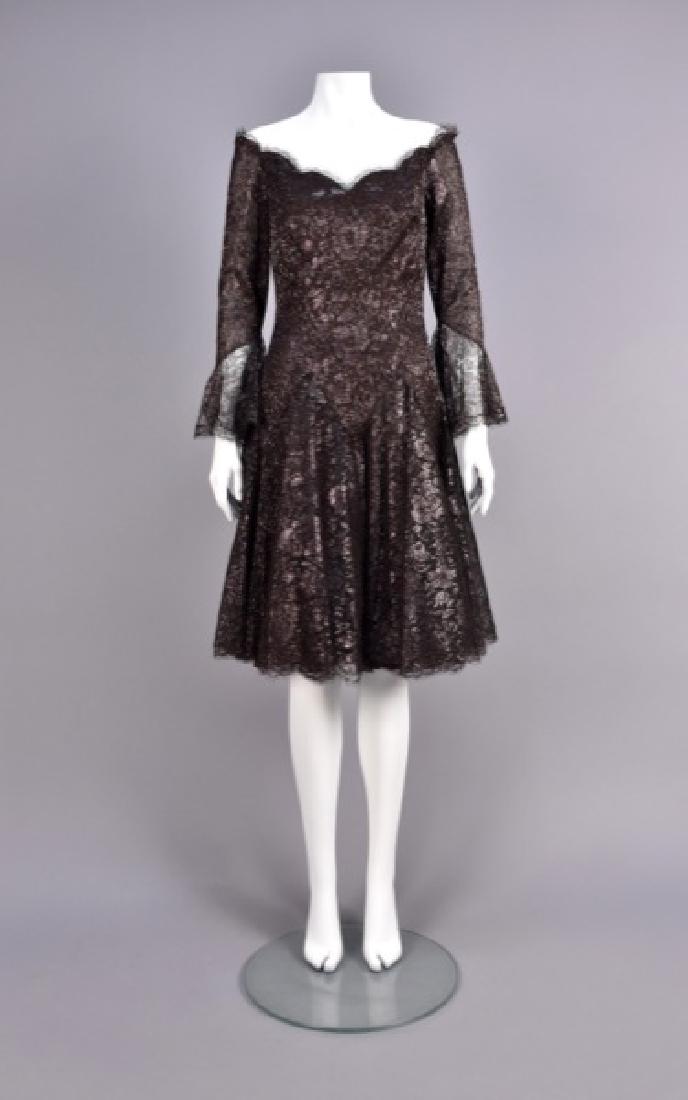 JEAN-LOUIS SCHERRER LACE COCKTAIL DRESS: Brown synthetic lace with bronze reflective threads over brown rayon having scalloped neckline, 3/4 ruffled sleeve, semi-boned bodice with waist points, full skirt with scalloped hem. Boutique label s