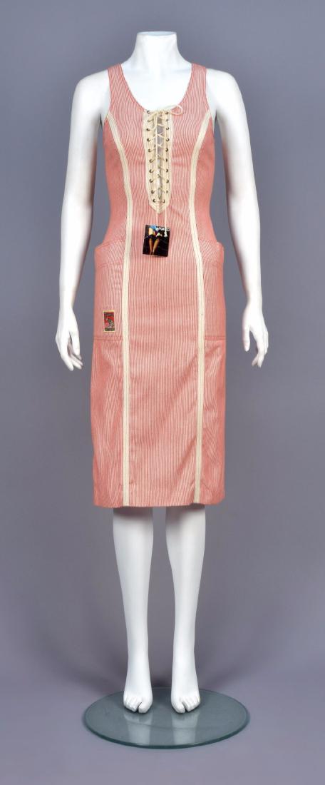 FIORUCCI DEADSTOCK STRIPED LACE-FRONT DRESS: Red and white striped cotton tank-style with white chevron-weave placket and princess seams, angled patch pockets at hip, decorative label on pocket, hangtag attached. B 32-34, W-26, H-34, L-44. (Grom