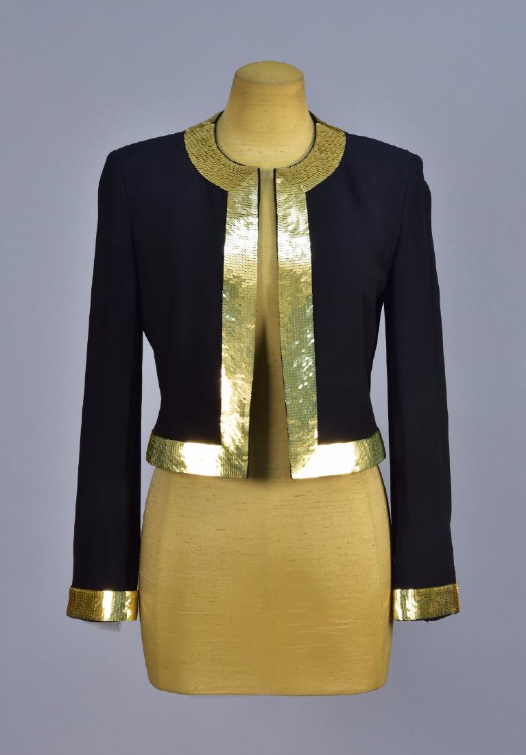 MOSCHINO SEQUIN TRIMMED JACKET: Black rayon-acetate blend, boxy collarless style with wide bands of gold sequined trim. "Couture!" label. B-34, Sh-15 1/2, Slv-23, L-19 1/2. Excellent.