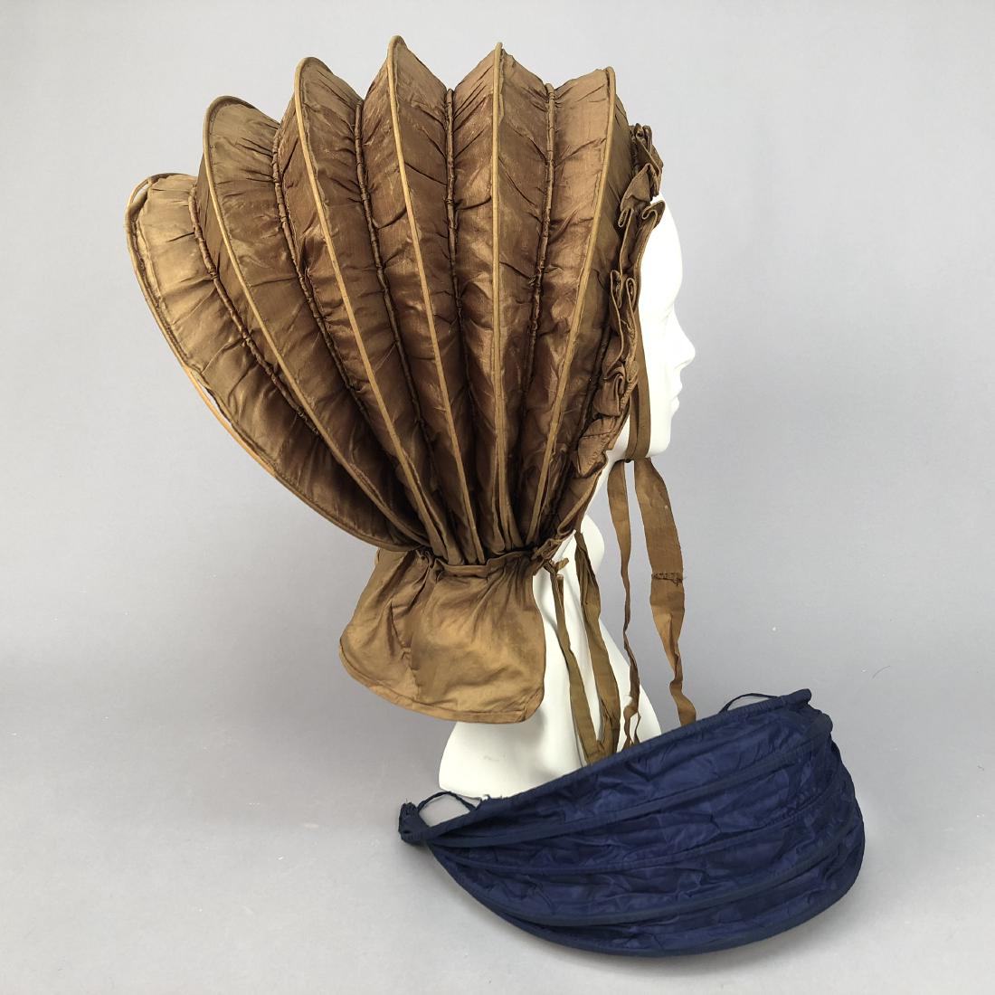 TWO COLLAPSIBLE SILK CALASH BONNETS, 1830s (1 of 3)