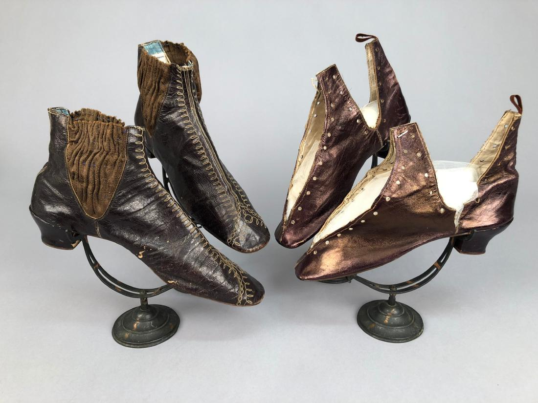 EMBROIDERED BOOTS with ELASTIC INSET, 1850s: Brown glazed leather having rounded square toe, embroidered with a pattern of cream loops, side gores inset with ruched brown elastic fabric, cotton lining and insole, L-10 1/2 with 1 1/2 inch heel. (