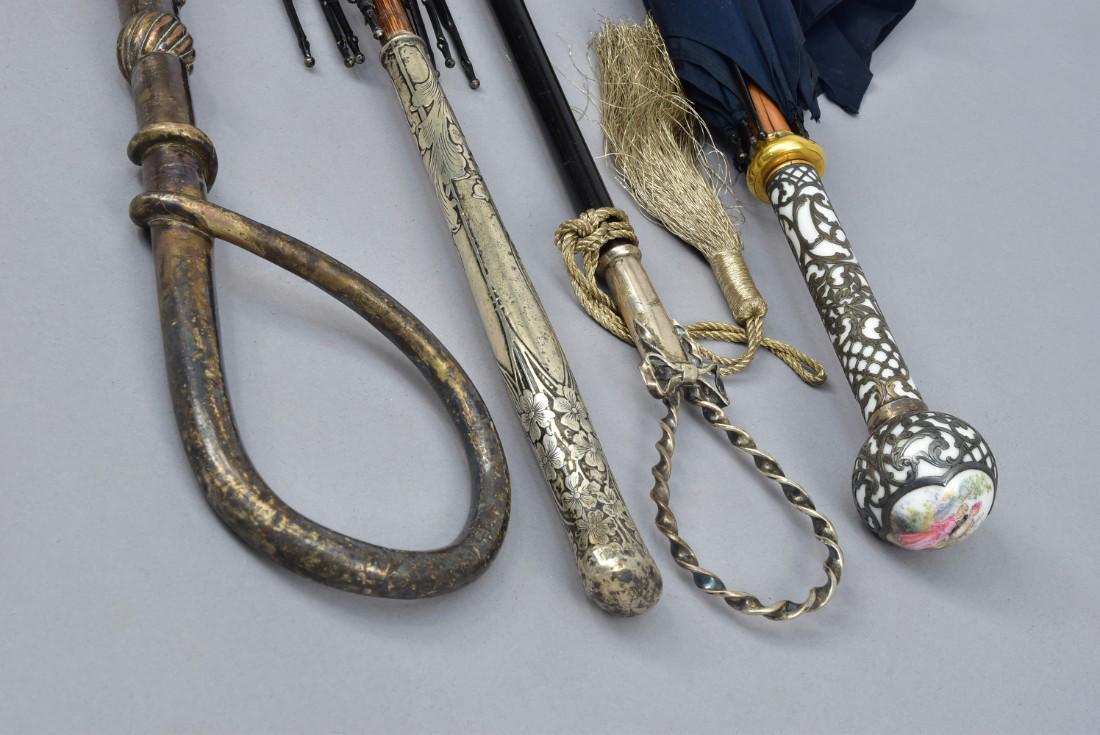 FOUR SILVER-HANDLED UMBRELLAS, LATE 19th - EARLY 20th C (1 of 3)