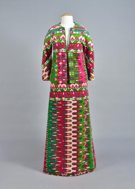 PUCCI VELVETEEN JACKET and MAXI SKIRT, 1970s: Pink, green and fuchsia abstract printed cotton, collarless jacket with 3/4 sleeve, hook & eye closures, A-line maxi skirt, labeled. B-33, jacket L-21, W-, H-36, skirt L-40. (Small tears along seams u