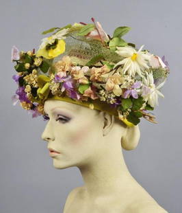 LILLY DACHE BUBBLE HAT and ADOLFO WIDE BRIM, 1970s: DachÃ© pale green net covered in various cloth flowers above green grosgrain ribbon band with front bow and back elastic adjustment, 13 x 5. Adolfo wide brim hat draped in floral printed crepe with