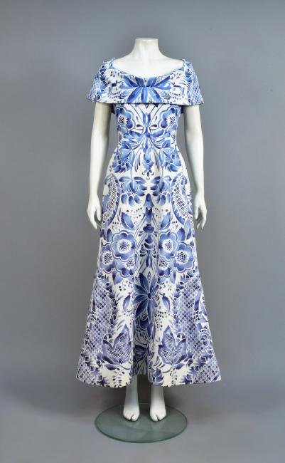 SCAASI SUMMER GOWN with DELFT-INSPRED PRINT: Feels like a silk blend in ribbed white with a large-scale blue watercolor floral, fitted sleeveless bodice with an off-the-shoulder drape and bell-shaped skirt, Boutique label. B-36, W-28, H-42, L-56
