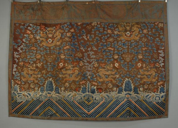 CHINESE SILK and GOLD METALLIC EMBROIDERED PANEL, : CHINESE SILK and GOLD METALLIC EMBROIDERED PANEL, 19th C Estate of Doris Duke to benefit DDCF. Possibly pieced from a chifu. Six dragons finely worked on a cloud band field, above a rainbow border, si