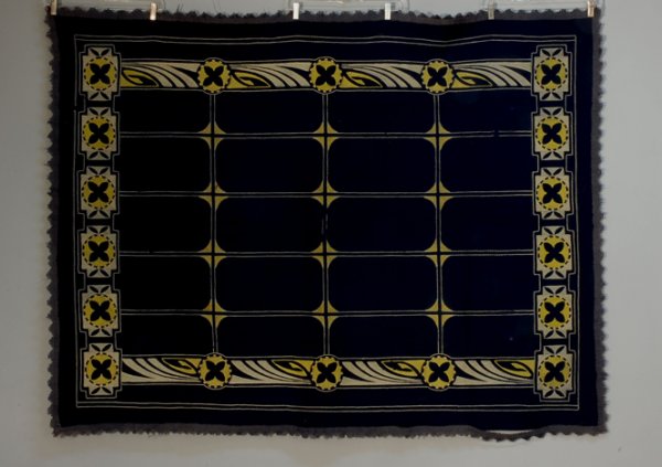 DANISH ARTS & CRAFTS TABLE COVER, c. 1900 Deep blu: DANISH ARTS & CRAFTS TABLE COVER, c. 1900 Deep blue wool embroiderd in pale green and grey, applied woven binding with scalloped short looped fringe. 50 x 64. Some binding unstitched, otherwise excell