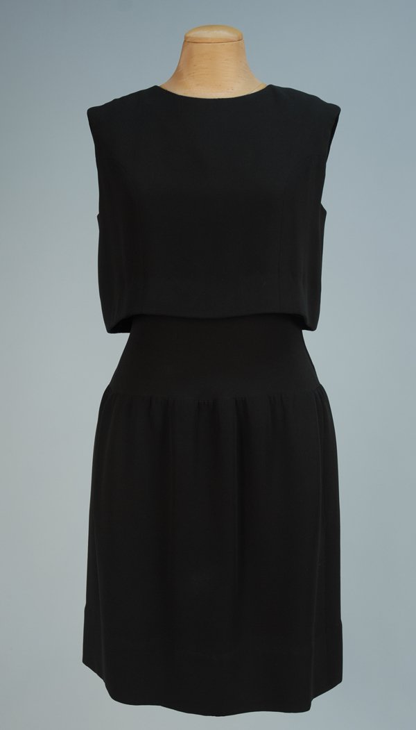 NORMAN NORELL 2-PIECE COCKTAIL DRESS, 1960's-1970': NORMAN NORELL 2-PIECE COCKTAIL DRESS, 1960's-1970's. Sleeveless black wool crepe dress with wide waistband, silk bodice top, gathered dropped skirt having side slit pockets, side zip, the separate she