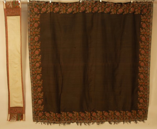 TWO EMBROIDERED WOOL TEXTILES, 19th C. Narrow hand: TWO EMBROIDERED WOOL TEXTILES, 19th C. Narrow hand embroidered cream Kashmiri stole with red, blue, green, black and gold border and wide double end bands, the outer having two fringed tabs, signed on