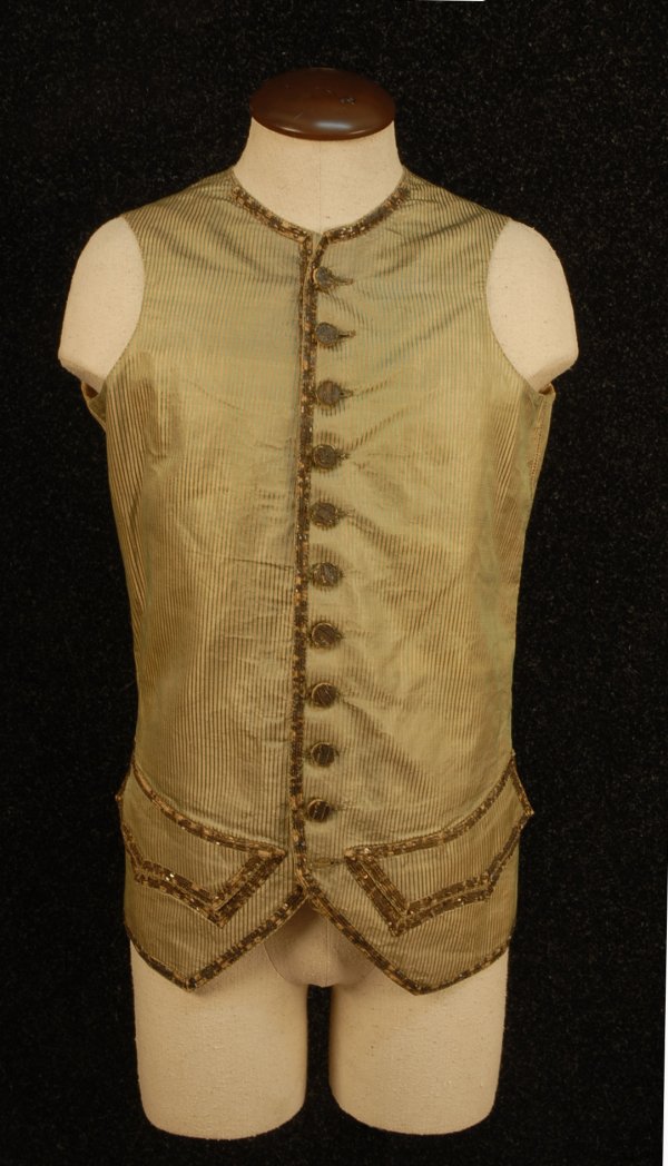 GENT'S RIBBED SILK WAISTCOAT, c. 1770. Raised gree: GENT'S RIBBED SILK WAISTCOAT, c. 1770. Raised green vertical stripe over gold having a horizontal rib, trimmed with a double band of sequins and metallic gold thread, eleven original sequin trimmed bu