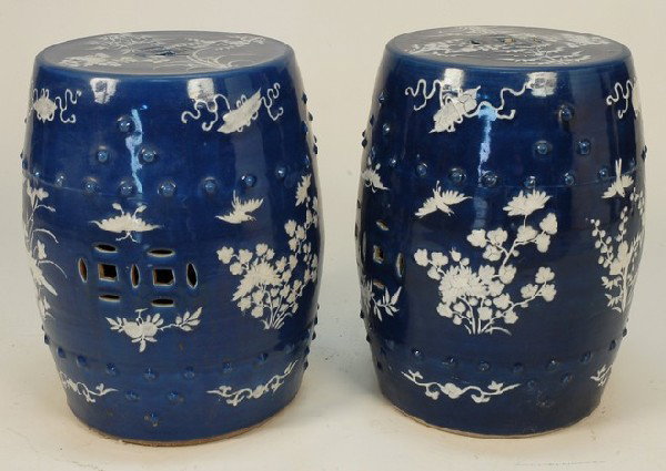 PAIR CHINESE BLUE and WHITE PORCELAIN GARDEN SEATS 19th: PAIR CHINESE BLUE and WHITE PORCELAIN GARDEN SEATS 19th C. Barrel form in blue decorated with white birds, flowers and butterflies. 14 x 18. Excellent.