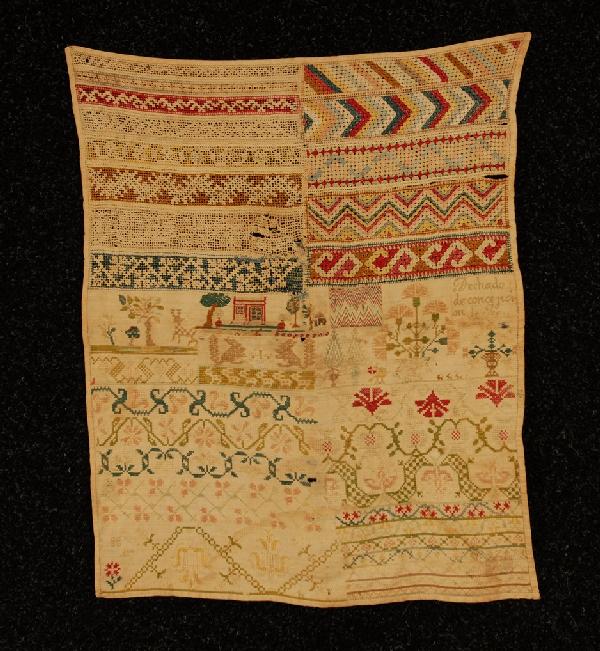 MEXICAN or SPANISH COLONIAL SAMPLER, LATE 18th C.: MEXICAN or SPANISH COLONIAL SAMPLER, LATE 18th C. Filet and embroidery in silk on linen, the top quadrants in colorful filet, pulled threads and drawn work in geometric patterns, center section in cro