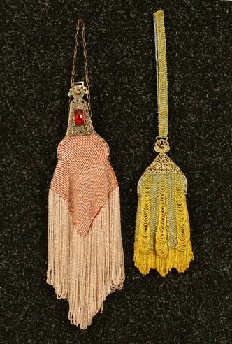 TWO BEADED PURSES with BRASS FILIGREE FRAMES, EARL: TWO BEADED PURSES with BRASS FILIGREE FRAMES, EARLY 20th C. Both wishbone form having ball and socket clasp, silk lining: One mounted with large faceted rectangular cabochon to each side, allover crys