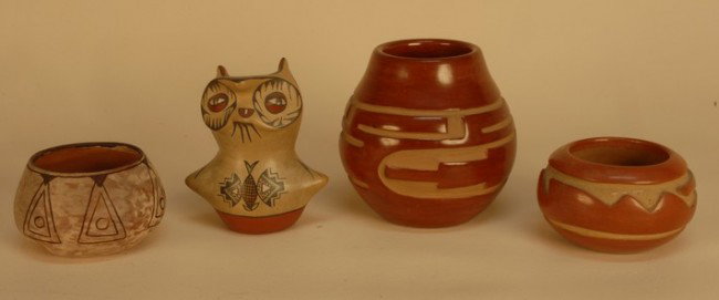THREE NATIVE AMERICAN SANTA CLARA POTTERY VESSELS,: THREE NATIVE AMERICAN SANTA CLARA POTTERY VESSELS, 20th C. Two carved red clay jars: One signed "Legoria", 6 inches. One illegible, possibly "Joy Cain", 3 inches. One decorated owl effigy vessel, sign