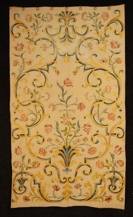 EMBROIDERED SILK PANEL 19th C. French silk moire e: EMBROIDERED SILK PANEL 19th C. French silk moire embroidered with colorful silk couching of flowers, vinework and vase. 46 x 80. (Minor loose threads) excellent.
