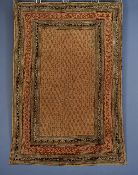 PERSIAN PRINTED COTTON KALAMKARI, EARLY 20th C. Yel: PERSIAN PRINTED COTTON KALAMKARI, EARLY 20th C. Yellow, red and black printed in a formal Oriental carpet arrangement of border and guard borders surrounding a field of repeating stylized cyprus trees