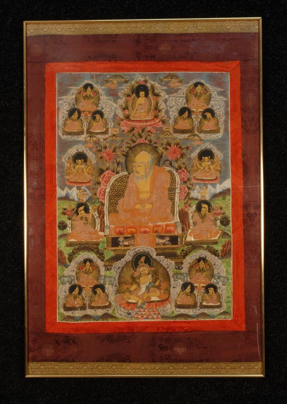 FRAMED THANKA, 19th C. Seated buddha with various: FRAMED THANKA, 19th C. Seated buddha with various manifestations surrounding, probably tempera on silk, not examined out of frame, silk brocade mat. Image 27 x 17. Excellent.