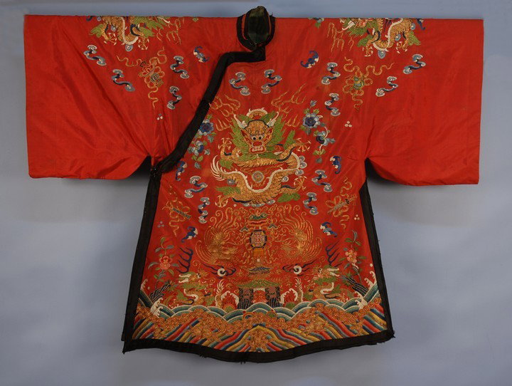 CHINESE SILK EMBROIDERED EIGHT DRAGON ROBE, 19th C: CHINESE SILK EMBROIDERED EIGHT DRAGON ROBE, 19th C. Cinnabar silk embroidered in colorful satin stitch and couched gold, the upper four dragons outward facing, the lower four side facing pairs flankin