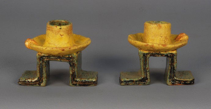 BAUDISCH WIENER WERKSTATTE CERAMIC CANDLESTICKS, c: BAUDISCH WIENER WERKSTATTE CERAMIC CANDLESTICKS, c. 1930. Executed by Gudrun Baudisch, member of WW 1926-1930, who worked closely with Valley Wieselthier. Geometric right angle bases in blue glaze wit