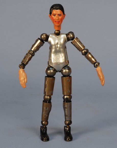 SWISS BUCHERER JOINTED STEEL DOLL, 1920's. Patente: SWISS BUCHERER JOINTED STEEL DOLL, 1920's. Patented steel body doll with composition male head, hands and boots, (no clothing). Height 8 inches. Excellent.