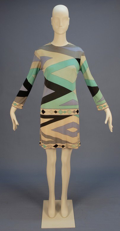PUCCI PRINTED SILK JERSEY DAY DRESS, c. 1970. Long: PUCCI PRINTED SILK JERSEY DAY DRESS, c. 1970. Long sleeve with signature "Emilio" geometric print in shades of grey, black, aqua, lilac and white, back zipper. Label "Emilio Pucci Florence - Italy". B