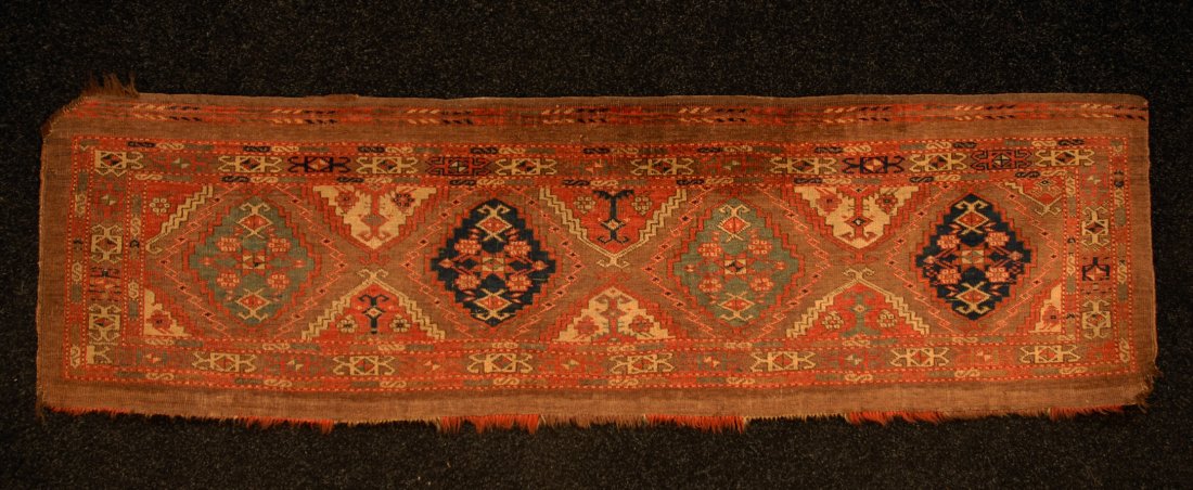 YOMUD MAT, 19th C. Long horizontal mat with four g: YOMUD MAT, 19th C. Long horizontal mat with four guls in blue and green. 66 x 18. (Corner losses) good.